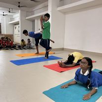 Students observing International Yoga Day